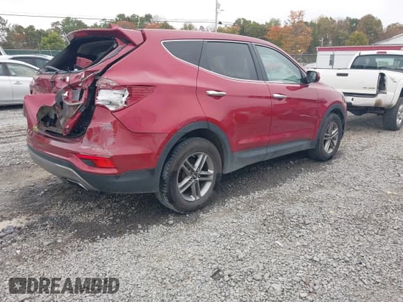 ✅ 2017 Hyundai Santa Fe 2.4L • VIN: 5XYZTDLB7HG403529 • Lot: 43428533. Listed on IAAI with 119,836 mi. Free auction sales archive from the USA and detailed vehicle history report at DreamBid. Image 4.