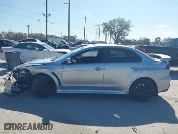 ✅ 2013 Mitsubishi Lancer Evolution MR • VIN: JA32W5FV6DU013470 • Lot: 41544077. Wystawiony na IAAI z przebiegiem 124 262 mil. Bezpłatny archiwum sprzedaży aukcyjnych z USA i szczegółowy raport historii pojazdu na DreamBid. Zdjęcie 14.