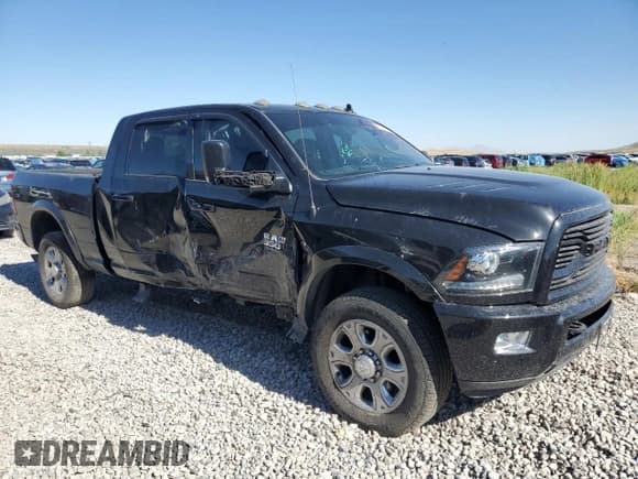 ✅ 2018 Ram 3500 Laramie • VIN: 3C63R3ML5JG164325 • Lot: 63039965. Wystawiony na Copart z przebiegiem 96 689 mil. Bezpłatny archiwum sprzedaży aukcyjnych z USA i szczegółowy raport historii pojazdu na DreamBid. Zdjęcie 4.