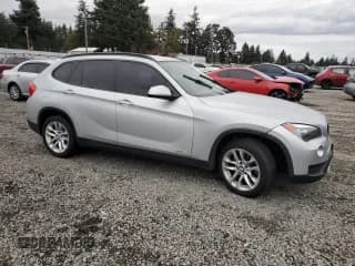 ✅ 2015 BMW X1 xDrive28i • VIN: WBAVL1C53FVY25890 • Лот: 82711785. Опубликован ранее на Copart с пробегом 65 683 миль. Бесплатный доступ к архиву аукционных продаж из США и подробный отчёт об истории автомобиля на DreamBid. Изображение 4.