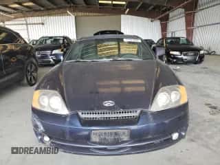 ✅ 2004 Hyundai Tiburon GS • VIN: KMHHM65D04U107131 • Лот: 72101305. Опубликован ранее на Copart с пробегом 136 073 миль. Бесплатный доступ к архиву аукционных продаж из США и подробный отчёт об истории автомобиля на DreamBid. Изображение 5.