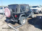✅ 1998 Jeep Wrangler Sport • VIN: 1J4FY19S6WP785535 • Lot: 43474999. Wystawiony na IAAI z przebiegiem 203 858 mil. Bezpłatny archiwum sprzedaży aukcyjnych z USA i szczegółowy raport historii pojazdu na DreamBid. Zdjęcie 4.