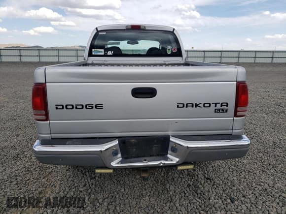 ✅ 2003 Dodge Dakota SLT • VIN: 1D7HG48NX3S261527 • Lot: 52986385. Wystawiony na Copart z przebiegiem 163 807 mil. Bezpłatny archiwum sprzedaży aukcyjnych z USA i szczegółowy raport historii pojazdu na DreamBid. Zdjęcie 6.