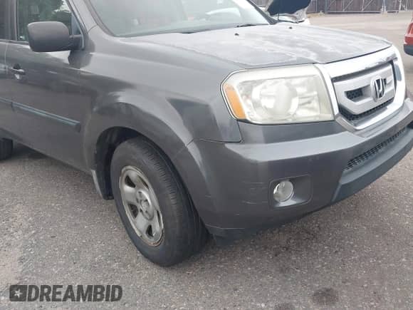 2010 Honda Pilot LX with VIN 5FNYF4H25AB006300, listed as a IAAI auction lot 42836359 with 205,176 mi miles and . Bid and sale history available at DreamBid. Image 6.