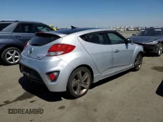✅ 2013 Hyundai Veloster Turbo • VIN: KMHTC6AE6DU109817 • Lot: 69486334. Wystawiony na Copart z przebiegiem 105 509 mil. Bezpłatny archiwum sprzedaży aukcyjnych z USA i szczegółowy raport historii pojazdu na DreamBid. Zdjęcie 3.