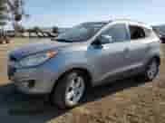 2011 Hyundai Tucson GLS z VIN KM8JU3ACXBU279726, wystawiony jako Copart lot #69819994 z przebiegiem 172 688 mil mil oraz Szkoda całkowita • Salvage title. Historia ofert i sprzedaży dostępna na DreamBid. Obrazek 1.