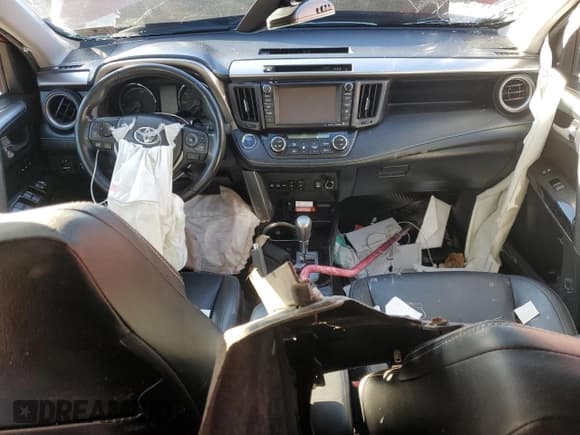 ✅ 2018 Toyota RAV4 Hybrid Limited • VIN: JTMDJREV1JD185905 • Lot: 67065885. Wystawiony na Copart z przebiegiem 23 948 mil. Bezpłatny archiwum sprzedaży aukcyjnych z USA i szczegółowy raport historii pojazdu na DreamBid. Zdjęcie 8.