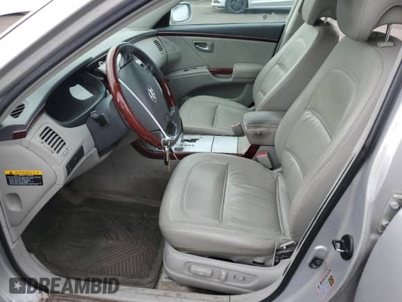 2006 Hyundai Azera SE z VIN KMHFC46F36A087430, wystawiony jako Copart lot #50927485 z przebiegiem 102 868 mil mil oraz Szkoda całkowita • Salvage title. Historia ofert i sprzedaży dostępna na DreamBid. Obrazek 7.