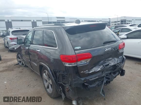 ✅ 2014 Jeep Grand Cherokee Overland • VIN: 1C4RJFCG6EC211600 • Lot: 43289489. Listed on IAAI with 133,935 mi. Free auction sales archive from the USA and detailed vehicle history report at DreamBid. Image 3.