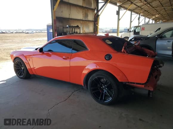 ✅ 2022 Dodge Challenger SRT Hellcat Redeye Widebody • VIN: 2C3CDZL99NH242003 • Lot: 38351624. Wystawiony na Copart z przebiegiem 6 876 mil. Bezpłatny archiwum sprzedaży aukcyjnych z USA i szczegółowy raport historii pojazdu na DreamBid. Zdjęcie 2.
