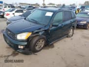 ✅ 2002 Toyota RAV4 • VIN: JTEGH20V920053101 • Lot: 43799614. Listed on IAAI with 274,761 mi. Free auction sales archive from the USA and detailed vehicle history report at DreamBid. Image 2.