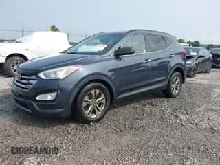 2014 Hyundai Santa Fe with VIN 5XYZUDLB5EG153555, listed as a IAAI auction lot 43145430 with 140,750 mi miles and . Bid and sale history available at DreamBid. Image 2.