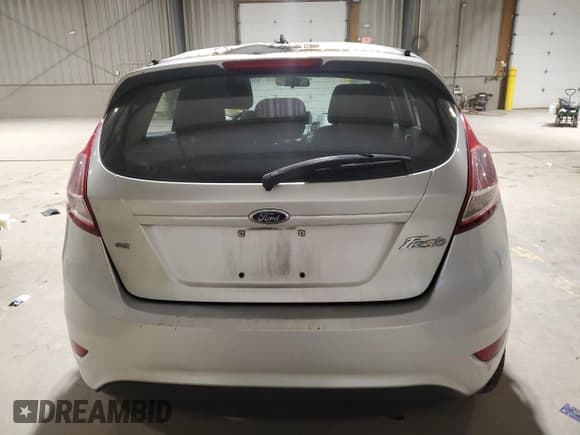 ✅ 2014 Ford Fiesta SE • VIN: 3FADP4EJ4EM179742 • Lot: 90696665. Wystawiony na Copart z przebiegiem 164 792 mil. Bezpłatny archiwum sprzedaży aukcyjnych z USA i szczegółowy raport historii pojazdu na DreamBid. Zdjęcie 6.