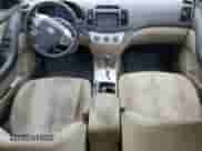 2009 Hyundai Elantra GLS z VIN KMHDU46D69U823833, wystawiony jako Copart lot #74582964 z przebiegiem 149 093 mil mil oraz Szkoda całkowita • Salvage title. Historia ofert i sprzedaży dostępna na DreamBid. Obrazek 8.