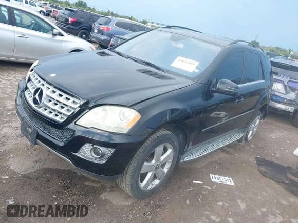 ✅ 2011 Mercedes-Benz M 350 • VIN: 4JGBB8GB7BA672347 • Lot: 43022379. Listed on IAAI with 154,147 mi. Free auction sales archive from the USA and detailed vehicle history report at DreamBid. Image 2.