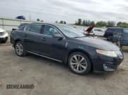 ✅ 2009 Lincoln MKS • VIN: 1LNHM93R19G626405 • Lot: 81612945. Listed on Copart with 85,128 mi. Free auction sales archive from the USA and detailed vehicle history report at DreamBid. Image 4.