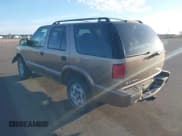 ✅ 2004 Chevrolet Blazer LS • VIN: 1GNDT13X74K143228 • Lot: 41761295. Wystawiony na IAAI z przebiegiem 149 003 mil. Bezpłatny archiwum sprzedaży aukcyjnych z USA i szczegółowy raport historii pojazdu na DreamBid. Zdjęcie 3.