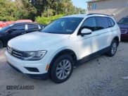 ✅ 2018 Volkswagen Tiguan S • VIN: 3VV0B7AX6JM119959 • Lot: 42967527. Listed on IAAI with 140,935 mi. Free auction sales archive from the USA and detailed vehicle history report at DreamBid. Image 2.