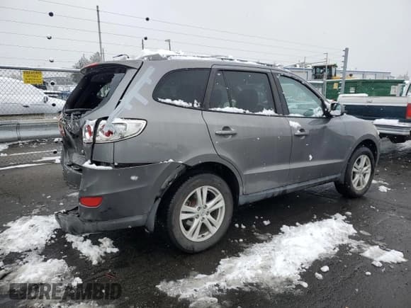 ✅ 2010 Hyundai Santa Fe SE • VIN: 5NMSH4AG7AH401115 • Lot: 79569044. Listed on Copart with 107,166 mi. Free auction sales archive from the USA and detailed vehicle history report at DreamBid. Image 3.