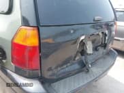 ✅ 2004 GMC Envoy SLT • VIN: 1GKET16S946225035 • Lot: 42416602. Listed on IAAI with Not provided. Free auction sales archive from the USA and detailed vehicle history report at DreamBid. Image 6.