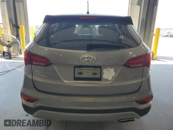 ✅ 2018 Hyundai Santa Fe 2.4L • VIN: 5NMZT3LB7JH085935 • Лот: 84585315. Опубликован ранее на Copart с пробегом 121 027 миль. Бесплатный доступ к архиву аукционных продаж из США и подробный отчёт об истории автомобиля на DreamBid. Изображение 6.
