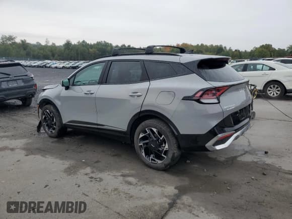 ✅ 2025 Kia Sportage SX-Prestige • VIN: 5XYK5CDF9SG245547 • Лот: 82053125. Опубликован ранее на Copart с пробегом 13 119 миль. Бесплатный доступ к архиву аукционных продаж из США и подробный отчёт об истории автомобиля на DreamBid. Изображение 2.