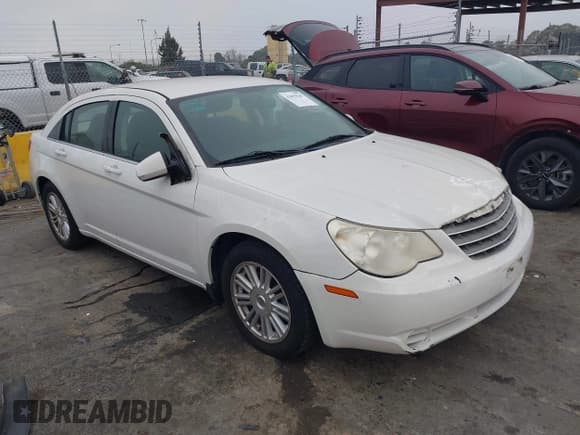 ✅ 2009 Chrysler Sebring Touring • VIN: 1C3LC56B49N531295 • Lot: 43859549. Listed on IAAI with 244,776 mi. Free auction sales archive from the USA and detailed vehicle history report at DreamBid. Image 1.