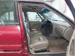 ✅ 1997 Pontiac Bonneville SE • VIN: 1G2HX52K5VH261373 • Lot: 40736098. Wystawiony na IAAI z przebiegiem 144 314 mil. Bezpłatny archiwum sprzedaży aukcyjnych z USA i szczegółowy raport historii pojazdu na DreamBid. Zdjęcie 5.