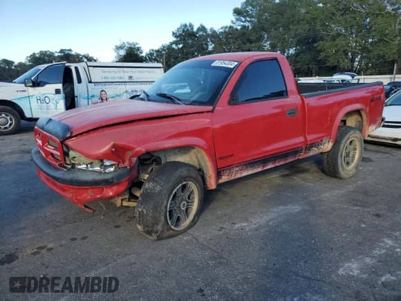 2003 Dodge Dakota with VIN 1D7GG16X73S202269, listed as a Copart auction lot 81954304 with Not provided miles and Salvage title. Bid and sale history available at DreamBid. Image 1.