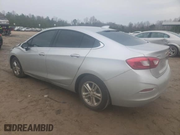 ✅ 2018 Chevrolet Cruze LT • VIN: 1G1BE5SM0J7105775 • Lot: 37842543. Listed on Copart with 132,935 mi. Free auction sales archive from the USA and detailed vehicle history report at DreamBid. Image 2.