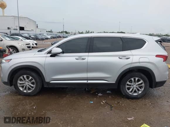 2019 Hyundai Santa Fe SEL Plus z VIN 5NMS33AD3KH130800, wystawiony jako IAAI lot #42666362 z przebiegiem 102 952 mil mil oraz . Historia ofert i sprzedaży dostępna na DreamBid. Obrazek 14.