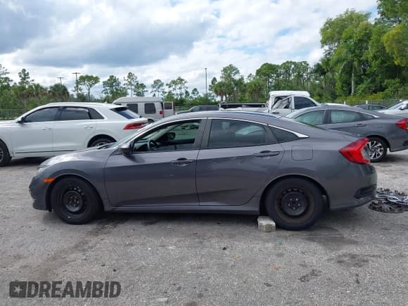 ✅ 2019 Honda Civic LX • VIN: 19XFC2F66KE041462 • Lot: 43564364. Wystawiony na IAAI z przebiegiem Nie podano. Bezpłatny archiwum sprzedaży aukcyjnych z USA i szczegółowy raport historii pojazdu na DreamBid. Zdjęcie 14.