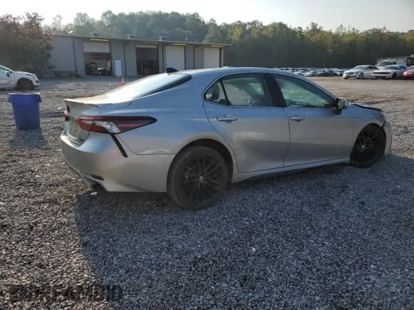 2021 Toyota Camry XSE с VIN 4T1K61AK3MU421363, выставлен на аукционе Copart как лот 80719775 с пробегом 129 804 миль миль и Списание • Salvage title. История ставок и продаж доступна на DreamBid. Изображение 3.