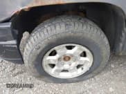 ✅ 2003 Chevrolet Tahoe LS • VIN: 1GNEK13Z13J287628 • Lot: 42145379. Wystawiony na IAAI z przebiegiem 141 957 mil. Bezpłatny archiwum sprzedaży aukcyjnych z USA i szczegółowy raport historii pojazdu na DreamBid. Zdjęcie 13.