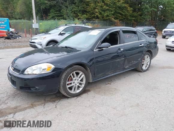 2012 Chevrolet Impala LTZ with VIN 2G1WC5E33C1155824, listed as a IAAI auction lot 43149723 with 148,084 mi miles and . Bid and sale history available at DreamBid. Image 17.