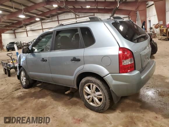 2009 Hyundai Tucson GLS z VIN KM8JM12B59U128264, wystawiony jako Copart lot #86692434 z przebiegiem 134 461 mil mil oraz Czysty tytuł • Clean title. Historia ofert i sprzedaży dostępna na DreamBid. Obrazek 2.