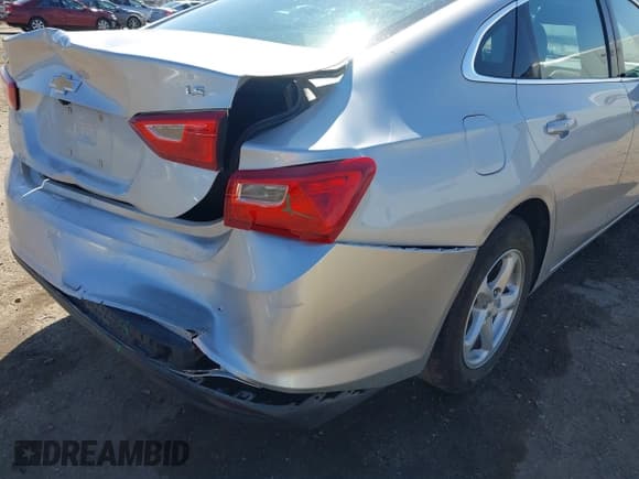 ✅ 2016 Chevrolet Malibu LS • VIN: 1G1ZB5ST9GF340558 • Lot: 42520463. Listed on IAAI with 104,296 mi. Free auction sales archive from the USA and detailed vehicle history report at DreamBid. Image 17.