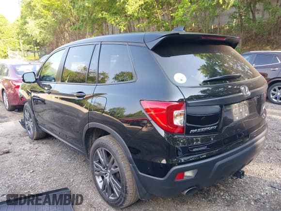 ✅ 2021 Honda Passport EX-L • VIN: 5FNYF8H57MB022083 • Lot: 42399294. Listed on IAAI with 61,014 mi. Free auction sales archive from the USA and detailed vehicle history report at DreamBid. Image 3.