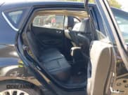 ✅ 2014 Ford Fiesta Titanium • VIN: 3FADP4FJ0EM200164 • Lot: 43450345. Wystawiony na IAAI z przebiegiem 107 553 mil. Bezpłatny archiwum sprzedaży aukcyjnych z USA i szczegółowy raport historii pojazdu na DreamBid. Zdjęcie 8.