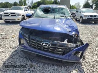 ✅ 2022 Hyundai Tucson SEL • VIN: 5NMJF3AE5NH004471 • Lot: 68179504. Wystawiony na Copart z przebiegiem 76 493 mil. Bezpłatny archiwum sprzedaży aukcyjnych z USA i szczegółowy raport historii pojazdu na DreamBid. Zdjęcie 5.