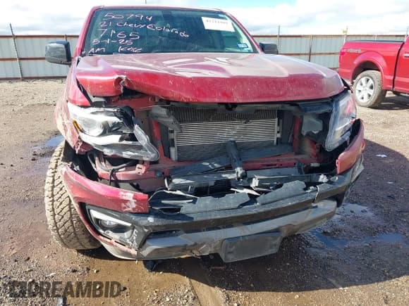 ✅ 2021 Chevrolet Colorado 2WD Z71 • VIN: 1GCGSDEN0M1107165 • Лот: 42211981. Опубликован ранее на IAAI с пробегом 115 906 миль. Бесплатный доступ к архиву аукционных продаж из США и подробный отчёт об истории автомобиля на DreamBid. Изображение 6.