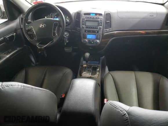 2012 Hyundai Santa Fe Limited с VIN 5XYZKDAG5CG144226, выставлен на аукционе Copart как лот 70772505 с пробегом 176 332 миль миль и Списание • Salvage title. История ставок и продаж доступна на DreamBid. Изображение 8.