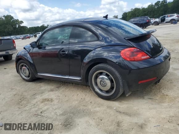 ✅ 2016 Volkswagen Beetle Wolfsburg Edition • VIN: 3VWF17AT8GM637442 • Lot: 55034595. Listed on Copart with 137,211 mi. Free auction sales archive from the USA and detailed vehicle history report at DreamBid. Image 2.