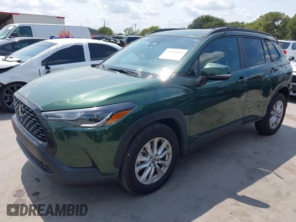 ✅ 2023 Toyota Corolla Cross LE • VIN: 7MUBAAAG9PV039027 • Lot: 42876685. Listed on IAAI with 41,046 mi. Free auction sales archive from the USA and detailed vehicle history report at DreamBid. Image 18.