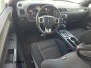 ✅ 2014 Dodge Challenger SXT • VIN: 2C3CDYAG1EH233887 • Lot: 66956594. Wystawiony na Copart z przebiegiem 112 788 mil. Bezpłatny archiwum sprzedaży aukcyjnych z USA i szczegółowy raport historii pojazdu na DreamBid. Zdjęcie 8.