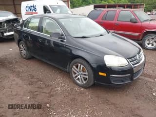 ✅ 2005 Volkswagen Jetta 2.5L • VIN: 3VWDF71K65M641809 • Лот: 42230703. Опубликован ранее на IAAI с пробегом 215 996 миль. Бесплатный доступ к архиву аукционных продаж из США и подробный отчёт об истории автомобиля на DreamBid. Изображение 1.