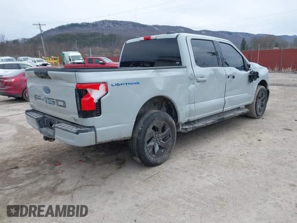 ✅ 2023 Ford F-150 Lightning Pro • VIN: 1FTVW1EL8PWG05596 • Лот: 41644473. Опубликован ранее на IAAI с пробегом 20 129 миль. Бесплатный доступ к архиву аукционных продаж из США и подробный отчёт об истории автомобиля на DreamBid. Изображение 4.