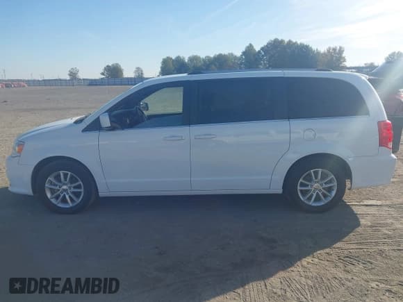✅ 2020 Dodge Grand Caravan SXT • VIN: 2C4RDGCG6LR153912 • Лот: 43641519. Опубликован ранее на IAAI с пробегом 204 586 миль. Бесплатный доступ к архиву аукционных продаж из США и подробный отчёт об истории автомобиля на DreamBid. Изображение 14.