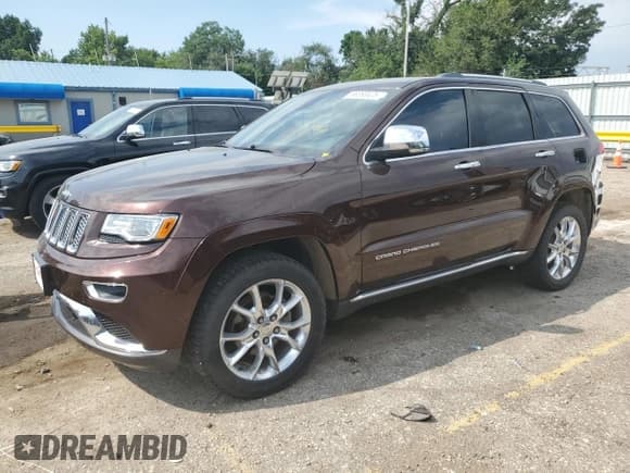 ✅ 2015 Jeep Grand Cherokee Summit • VIN: 1C4RJFJGXFC118339 • Lot: 68393425. Listed on Copart with 114,259 mi. Free auction sales archive from the USA and detailed vehicle history report at DreamBid. Image 1.