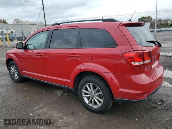 ✅ 2013 Dodge Journey SXT • VIN: 3C4PDDBG4DT519078 • Lot: 82585735. Listed on Copart with 95,501 mi. Free auction sales archive from the USA and detailed vehicle history report at DreamBid. Image 2.